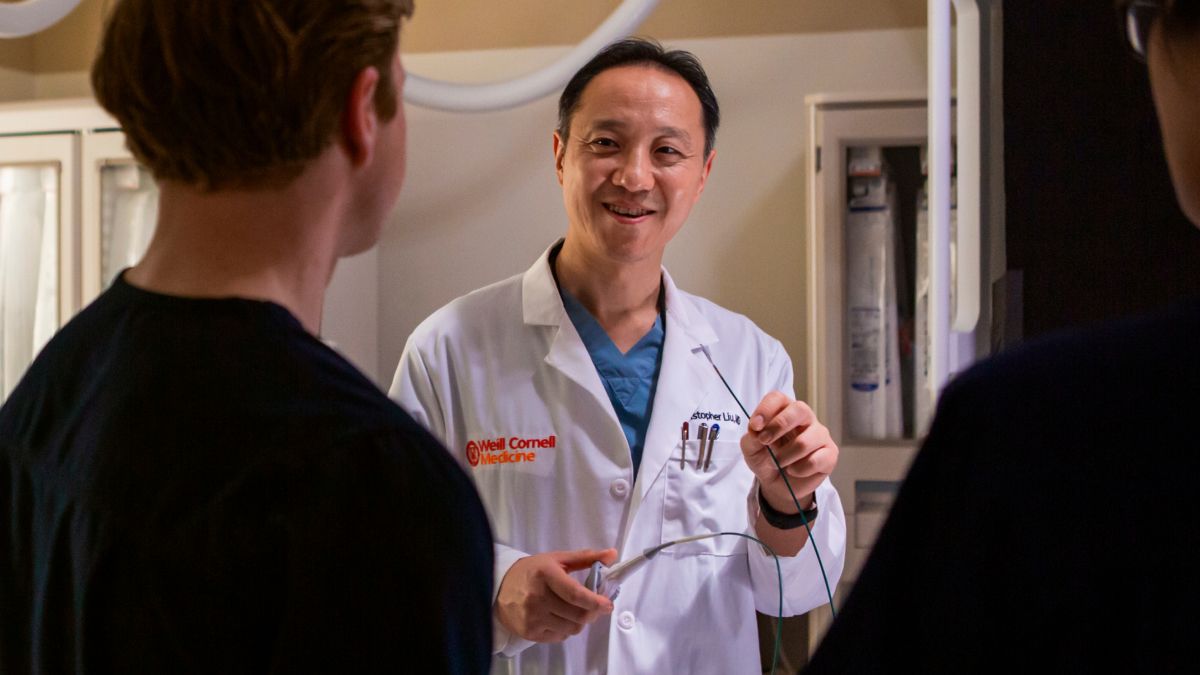 Dr. Liu collaborating with colleagues