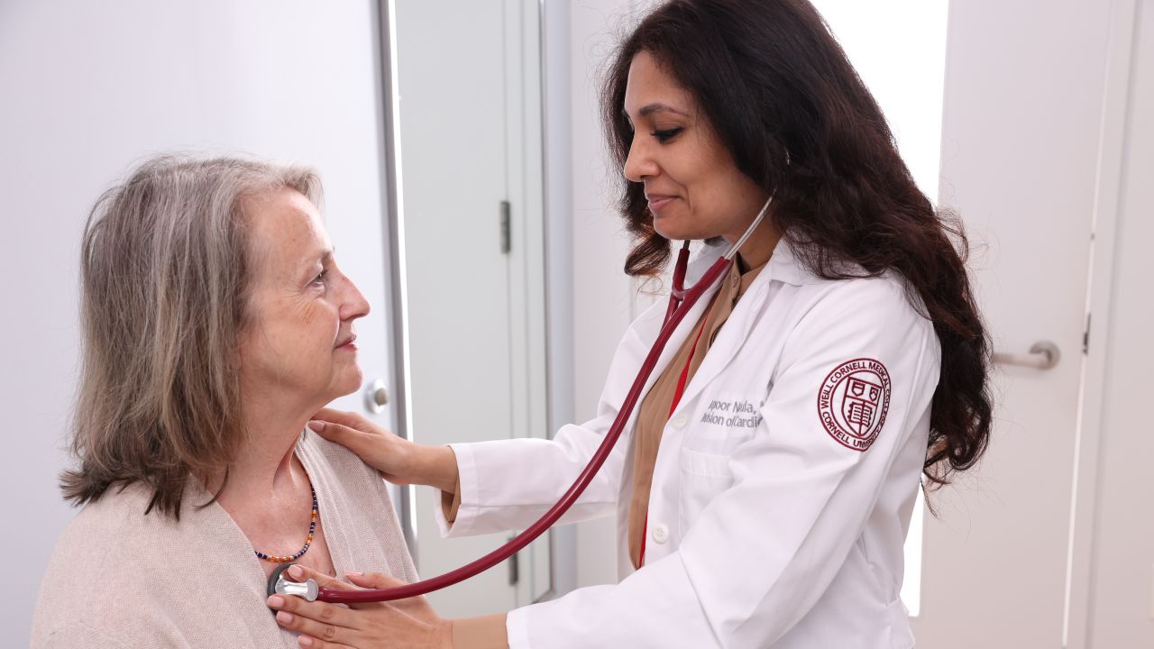 Dr. Narula listening to the heartbeat of a patient